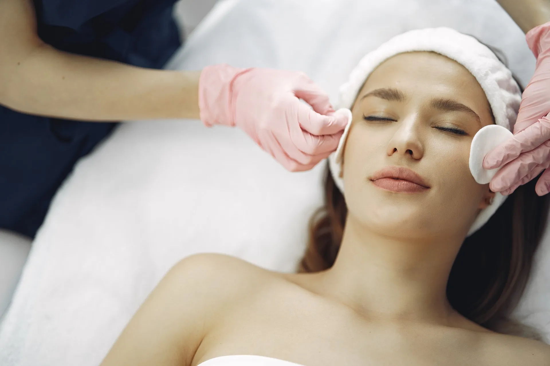 Women smiling and enjoying skincare treatment