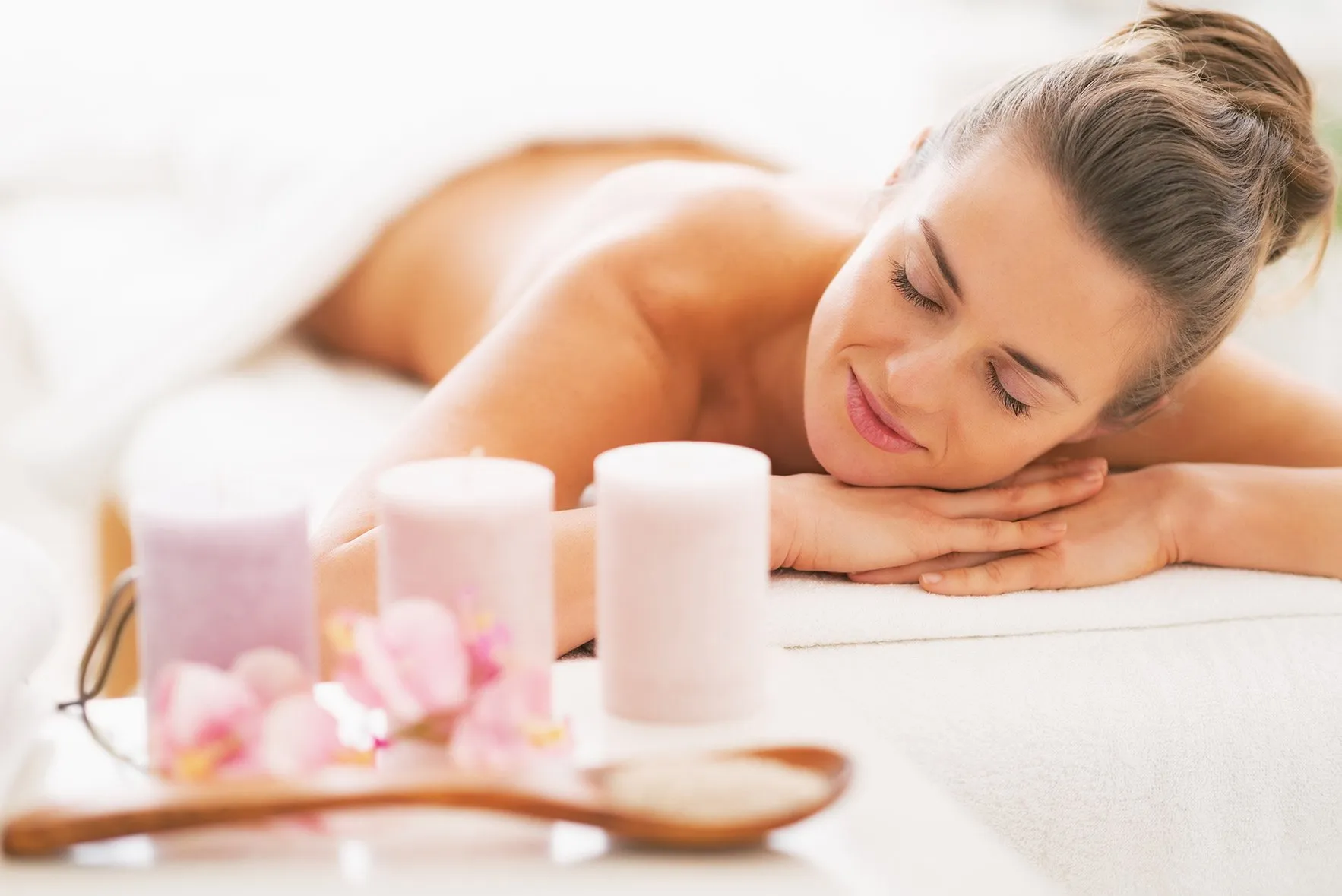 Happy patient enjoying spa therapy and beauty transformation